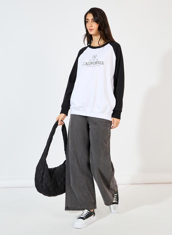 Styli Oversized Longline Slogan Print Sweatshirt - Image 2