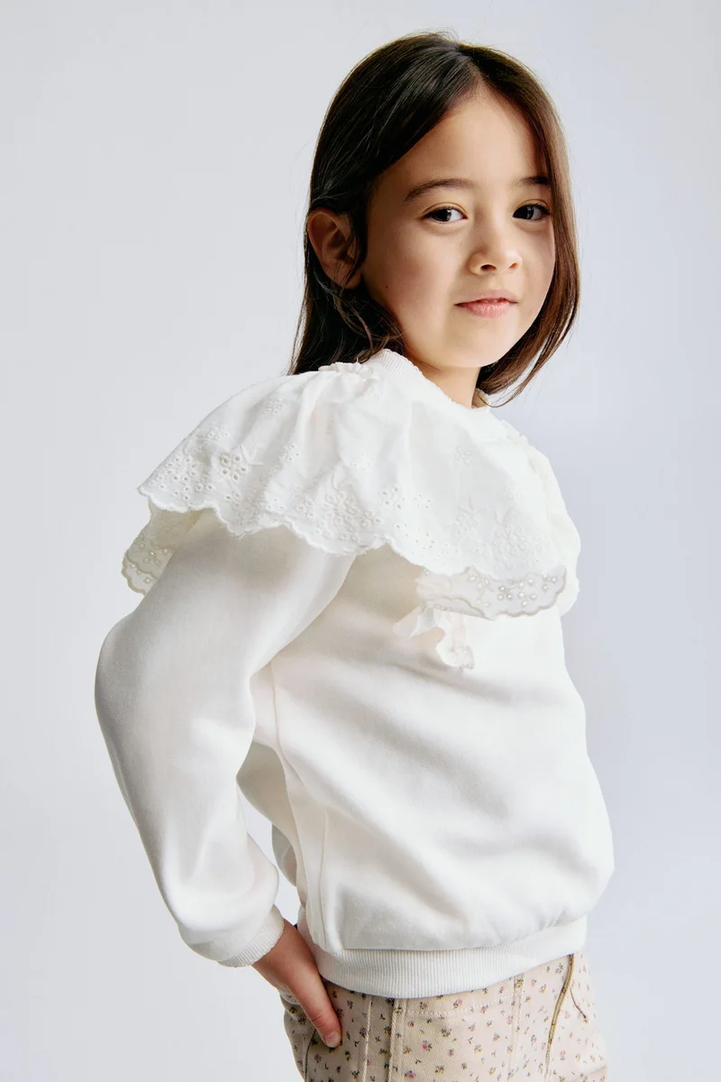 اتش اند ام سويت شيرت بحواف مكشكشة