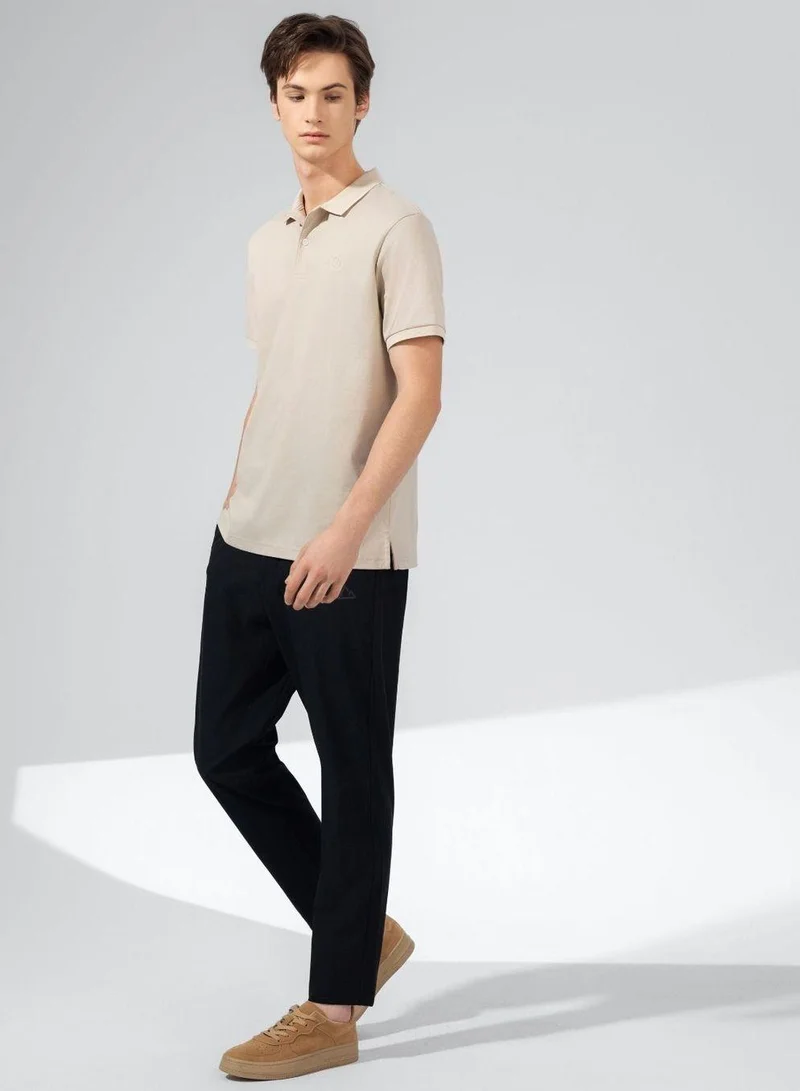 جيوردانو قميص بولو رجالي بقصّة Slim Fit Liquid Touch