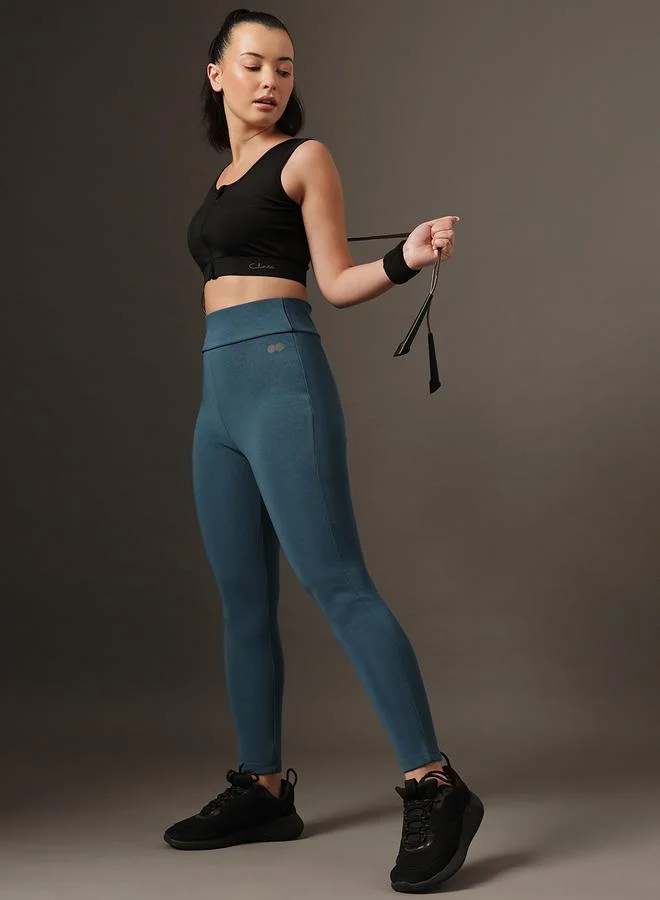 Clovia  Teal Solid High-Rise Textured Activewear Leggings for Women | Best Price UAE