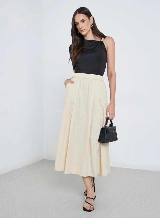 Styli Elastic Waistband A-Line Maxi Skirt