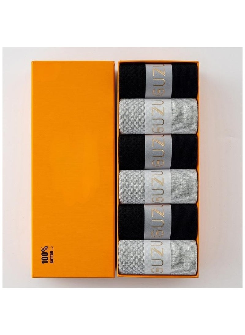 6 Pairs Of Boxed Men's Solid Color Business Style Minimalist Mid Length Socks  - Image 1