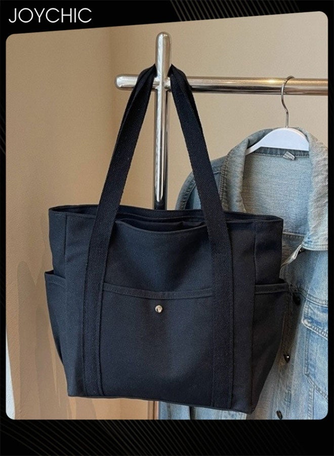 Joychic حقيبة توت كبيرة السعة للنساء مصنوعة من القماش مقاومة للماء مع جيوب حقيبة يد للسفر عادية حقيبة بسحاب موضة حقيبة كتف سوداء - Image 1