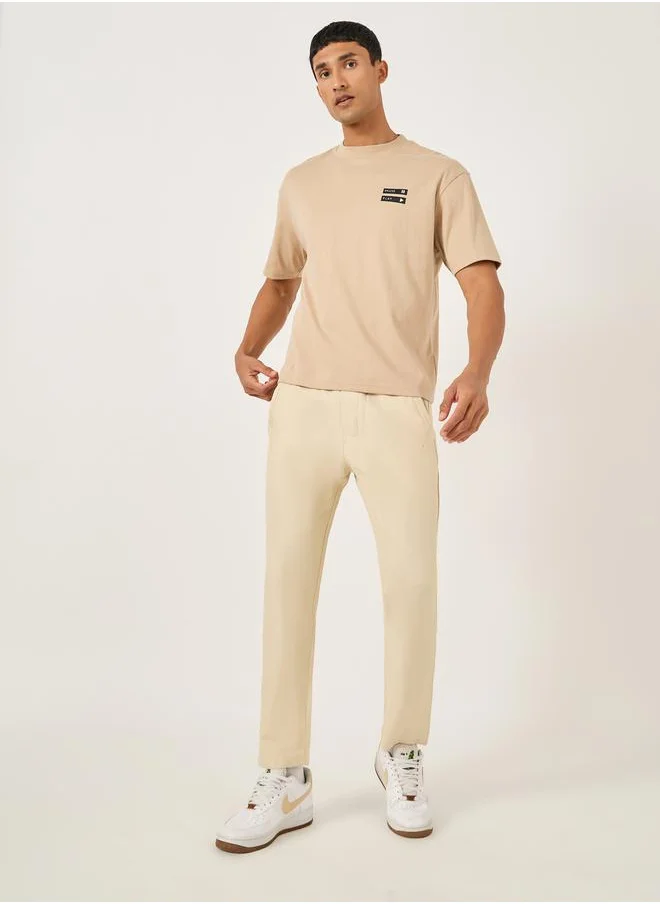 فورت كولينز Men Beige Solid Straight Leg Pants with Drawstring Waist