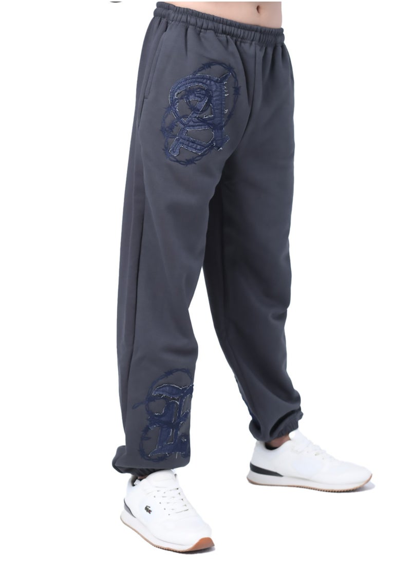 Applique sweatpants with embroidered patchwork - pzsku/Z95A74B0A8FD16F154DCDZ/45/_/1738488767/b641cb58-2034-49ef-935a-33319241973f