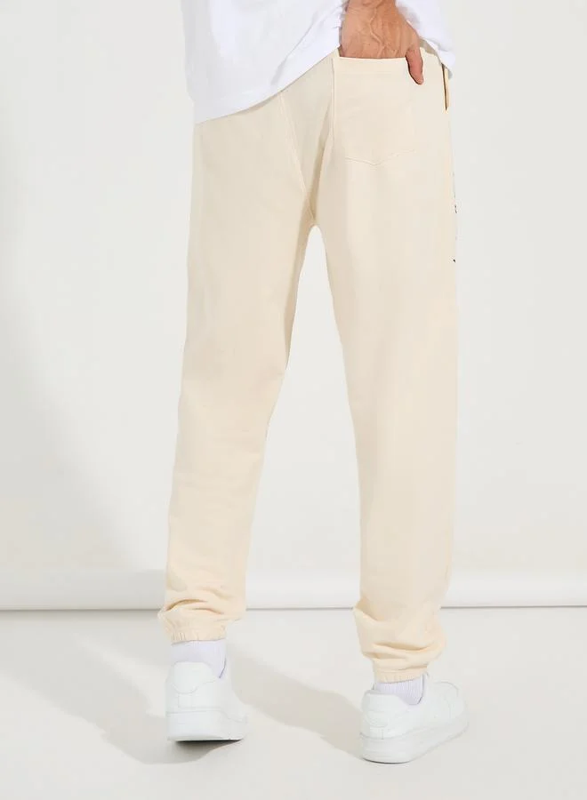 Styli Slogan Print Oversized Fit Jogger with Slip Pocket