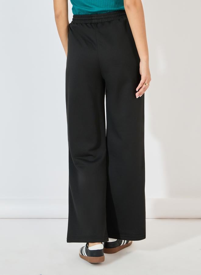 Styli Solid Wide Leg Joggers with Drawstring Closure - Image 4
