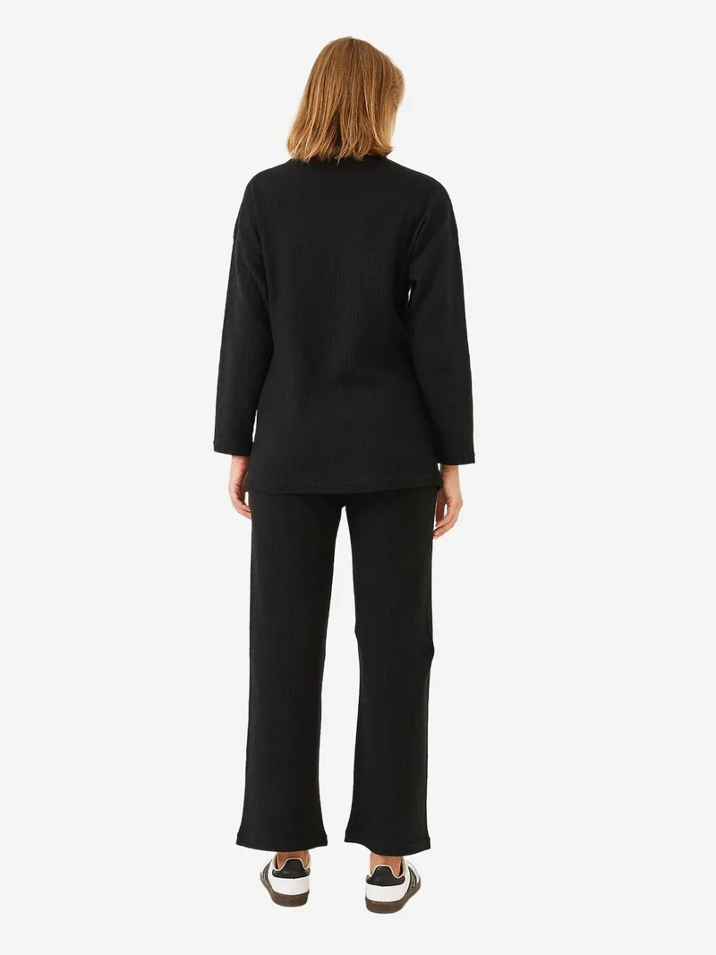 بيانكو لوتشي طقم سترة وسروال بياقة دائرية بنقش مضلع من لوكسي