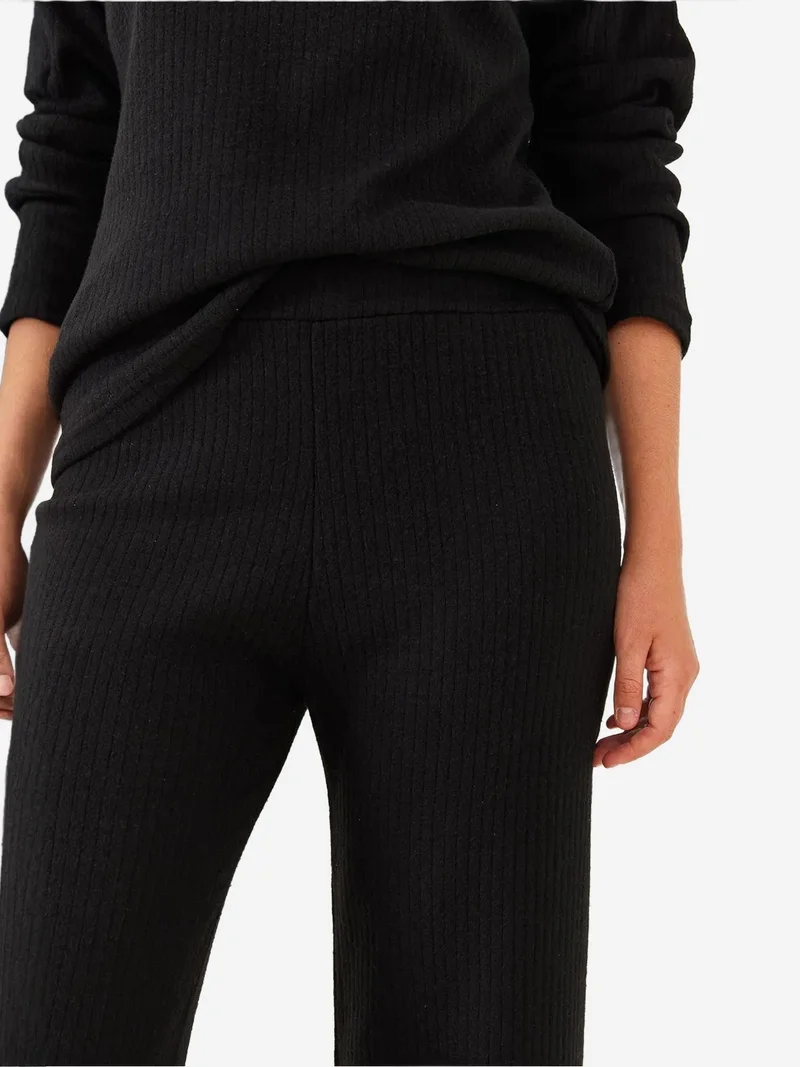 بيانكو لوتشي طقم سترة وسروال بياقة دائرية بنقش مضلع من لوكسي