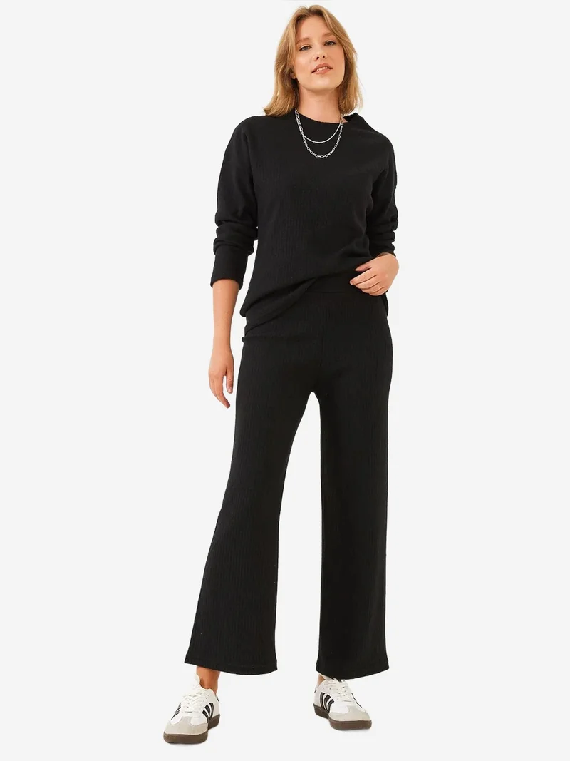 بيانكو لوتشي طقم سترة وسروال بياقة دائرية بنقش مضلع من لوكسي