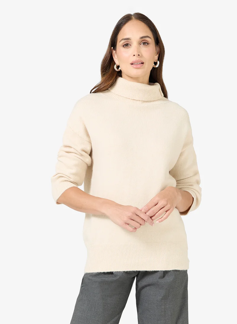 ايلا كنزة بياقة سلحفاة كلاسيكية