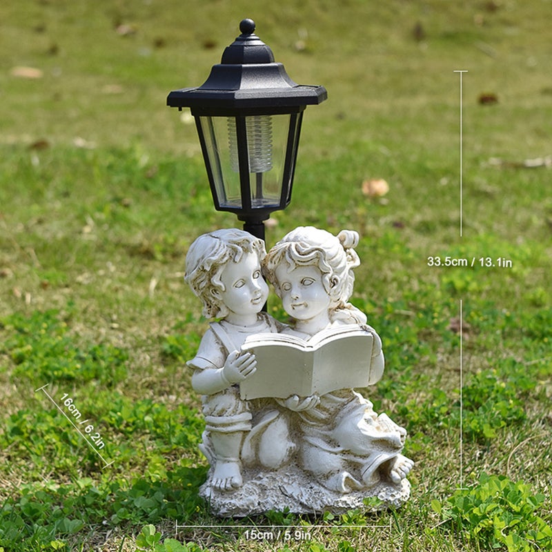 Resin Reading Boy and Girl Solar Outdoor Light Statue for Garden Landscape Figurine Decor - Image 1