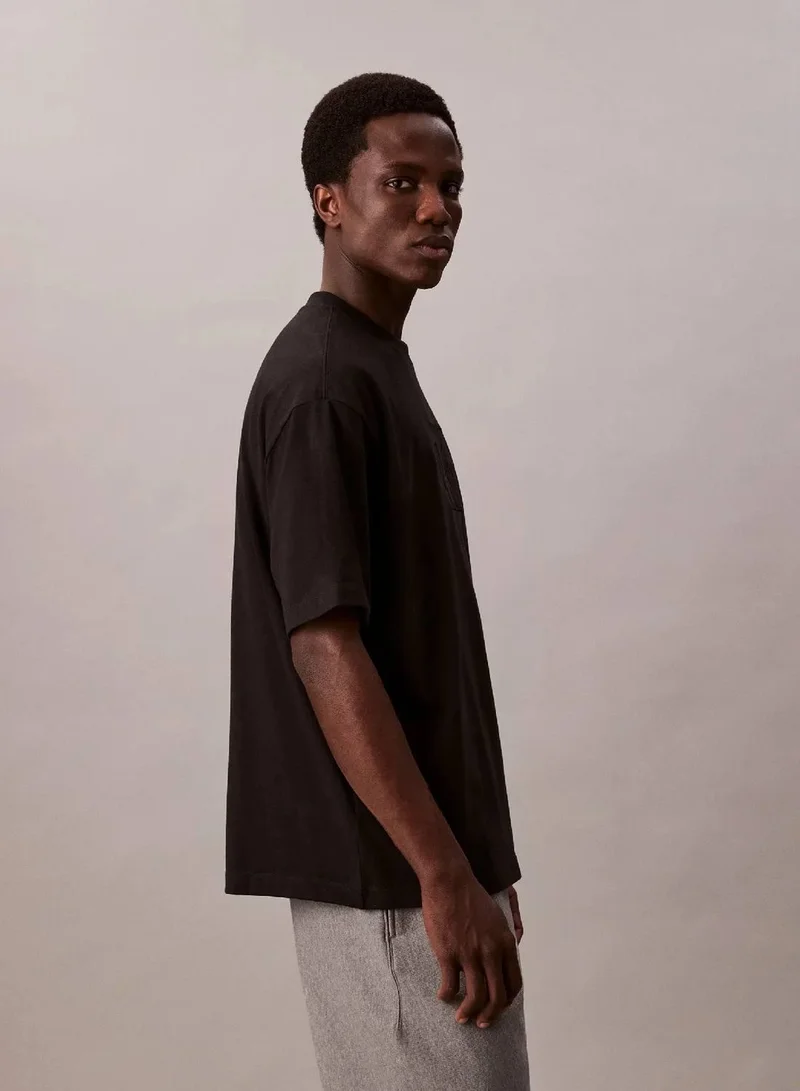 Calvin Klein Jeans Black Relaxed Monogram T-shirt for Men | Best Price UAE