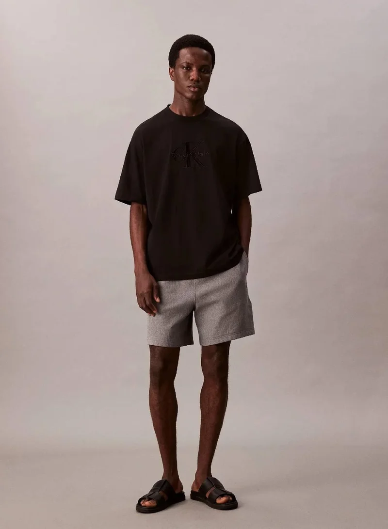 Calvin Klein Jeans Black Relaxed Monogram T-shirt for Men | Best Price UAE
