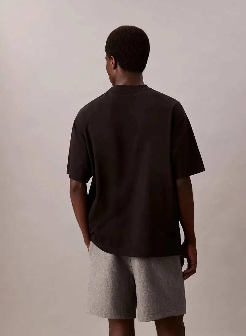 Calvin Klein Jeans Black Relaxed Monogram T-shirt for Men | Best Price UAE