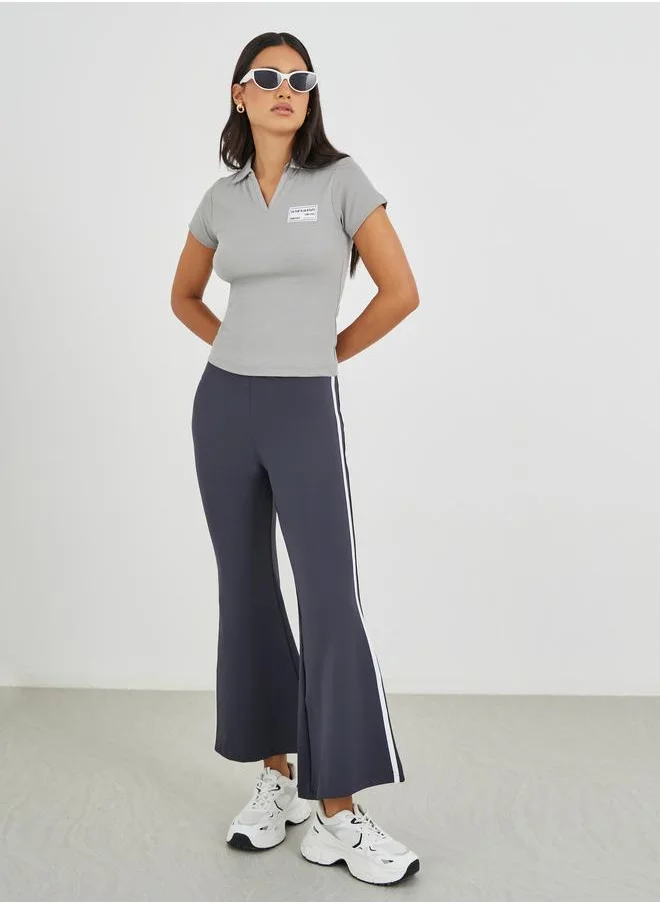 Styli Styli Wide Ribbed Contrast Badge Detail Cropped Polo T-Shirt