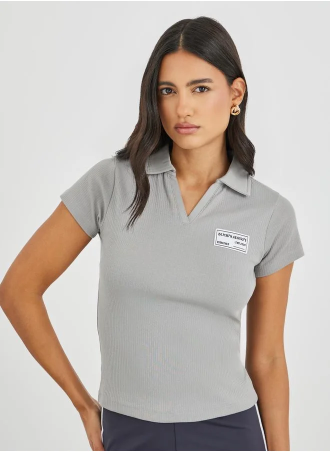 Styli Styli Wide Ribbed Contrast Badge Detail Cropped Polo T-Shirt