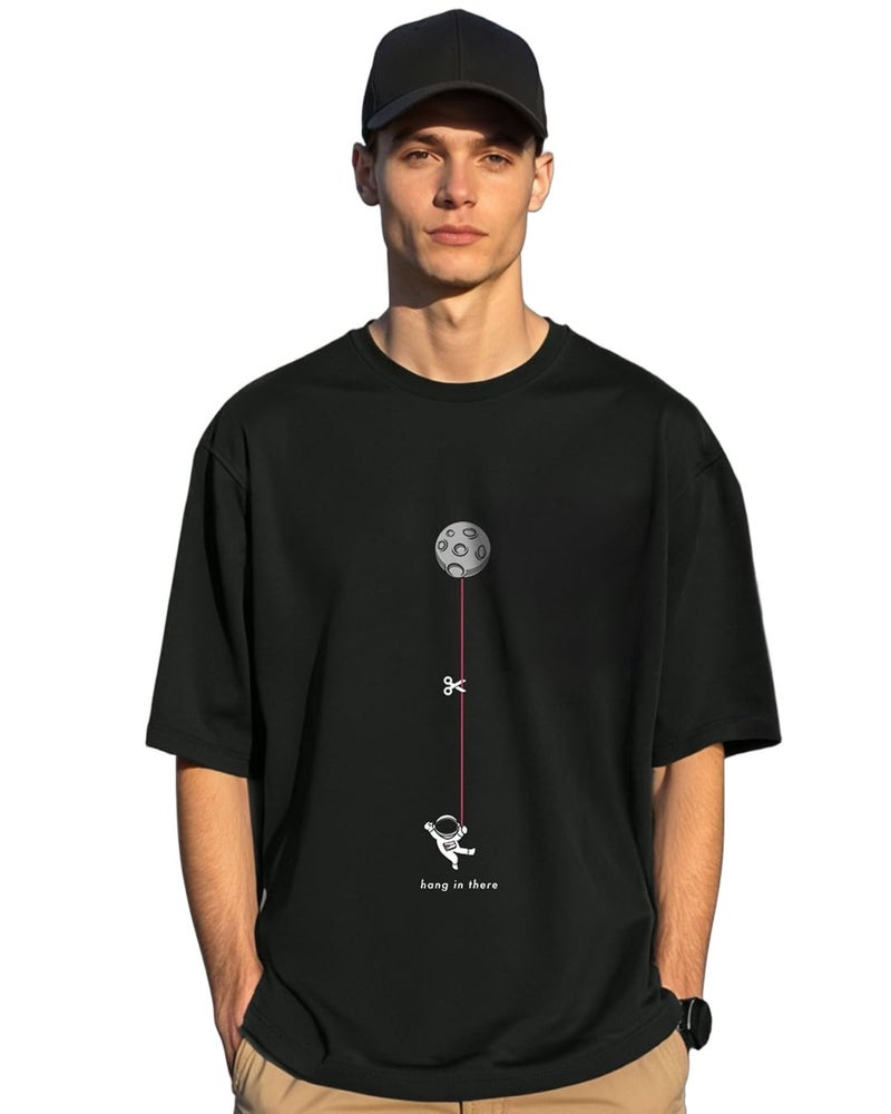 Bewakoof Men's Hangin Astronaut Graphic Printed 100% Cotton T-Shirt - Oversized Fit, Round Neck, Half Sleeves Black - Image 1