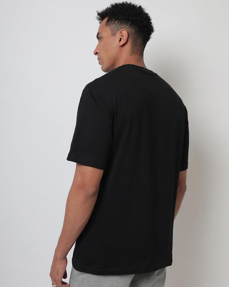 Bewakoof Men's Hangin Astronaut Graphic Printed 100% Cotton T-Shirt - Oversized Fit, Round Neck, Half Sleeves Black - Image 4