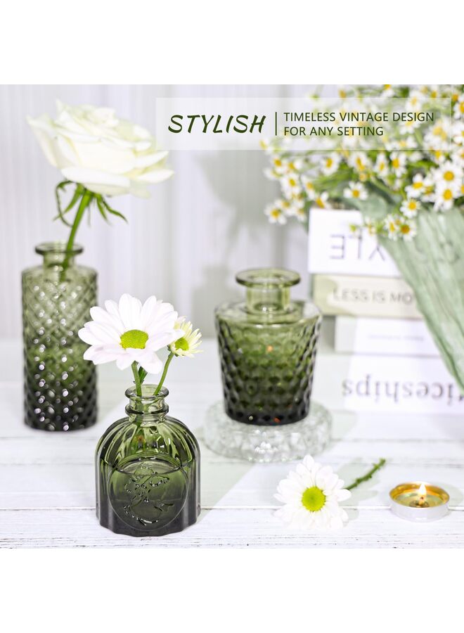 يُسلِّم مجموعة من 12 مزهرية زجاجية صغيرة داكنة اللون، مثالية لتزيين الطاولات. - Image 4