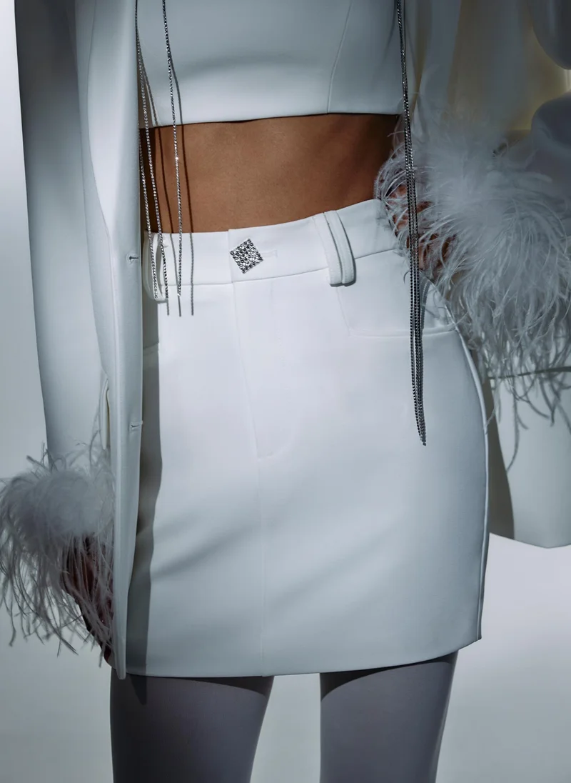 Lichi Mini skirt with accent button