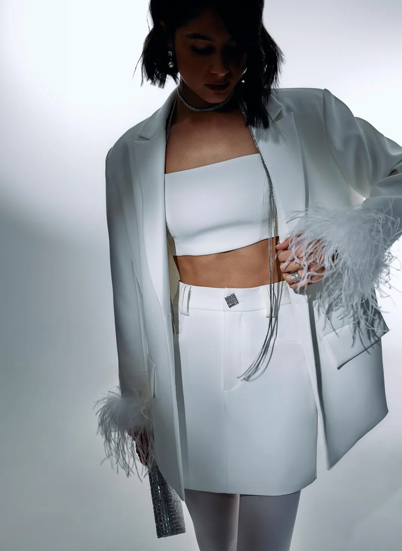 Lichi Mini skirt with accent button