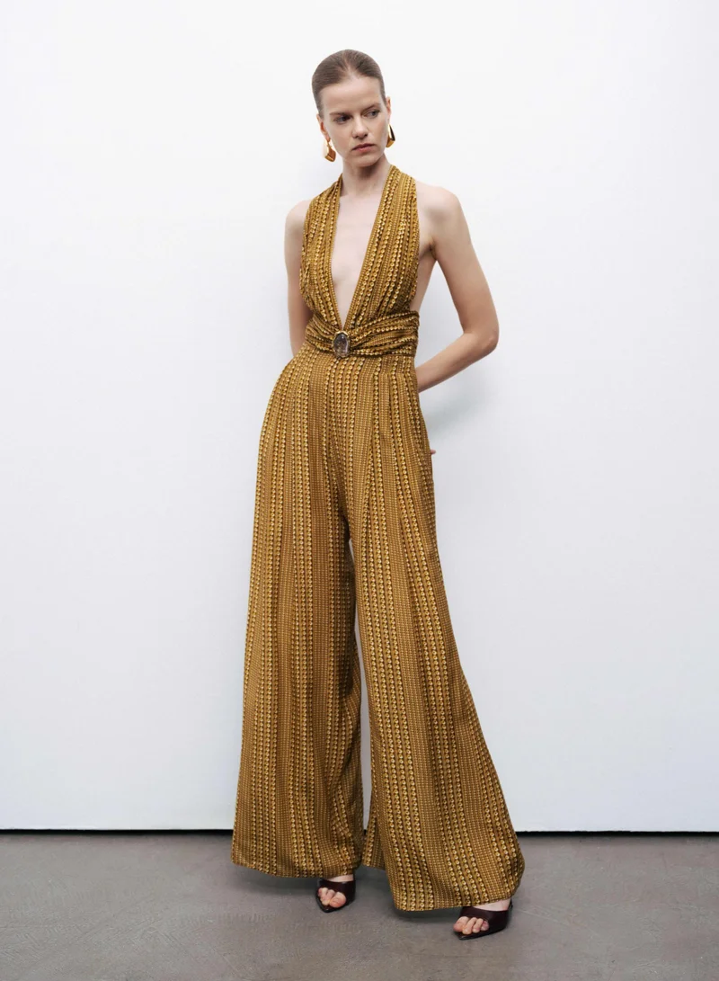 نوكتورن Jumpsuit with Gold and Stone Accessory