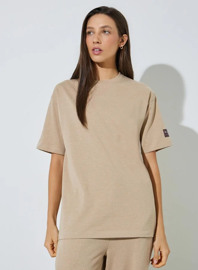 ستايلي Badge Detail T-Shirt and Wide Leg Joggers Co-Ords