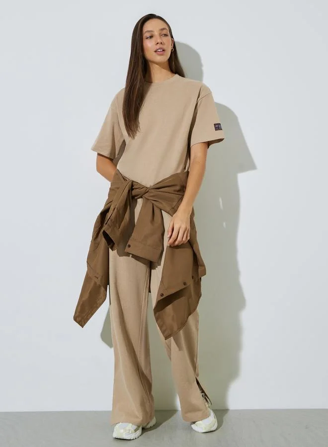 ستايلي Badge Detail T-Shirt and Wide Leg Joggers Co-Ords