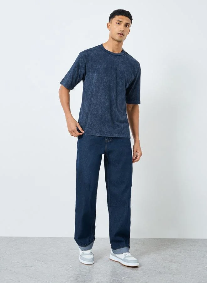 ستايلي تيشيرت جيرسي مغسول بحمض مع تفاصيل أبليك