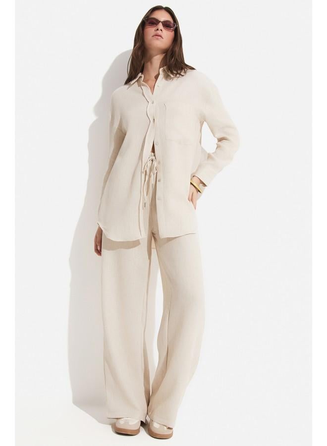 جون بنطلون نسائي واسع الساق بخصر مطاطي من فيسكوز - حصري يونيو - حجر - Image 2