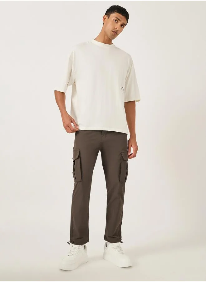فورت كولينز Men Brown Solid Cargo Pants with Drawstring Hem
