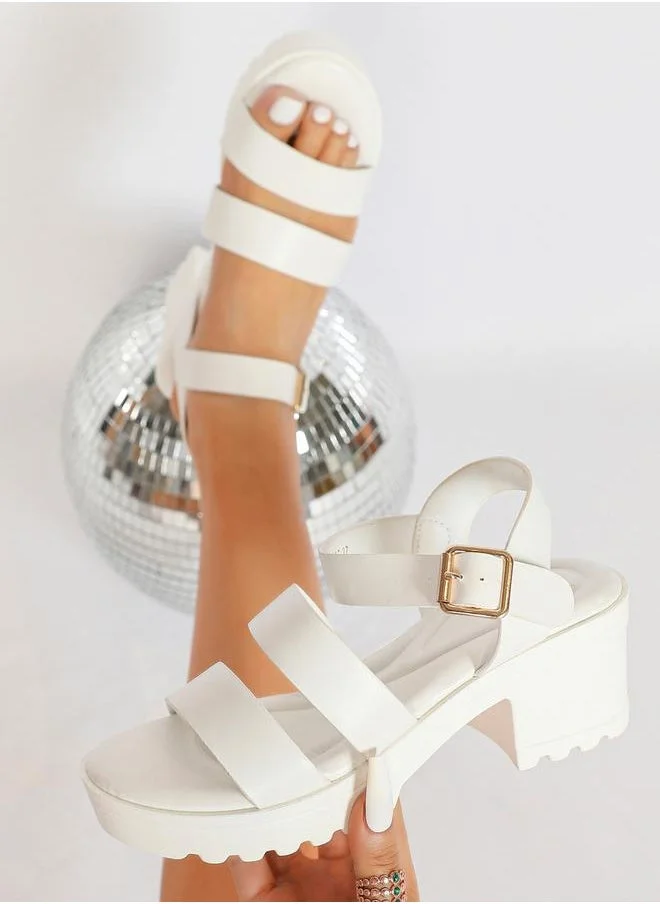 Sneak-a-Peek Solid Ankle Strap Block Heel Sandals by Styli