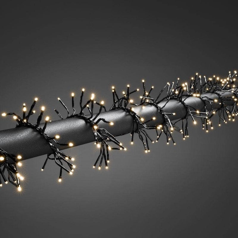 أضواء عيد الميلاد المجمعة بتقنية LED الصغيرة من كونستسمايد / للاستخدام الخارجي أو الداخلي (IP44) / محول 36 فولت / 8 وظائف، مع وحدة تحكم ذاكرة / 1152 ثنائي ضوء أبيض دافئ / أضواء سلكية سوداء