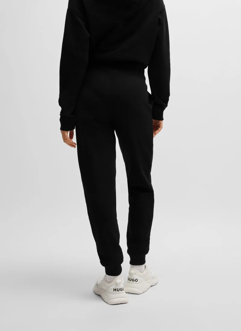 هوجو Cotton-terry tracksuit bottoms with stacked logo