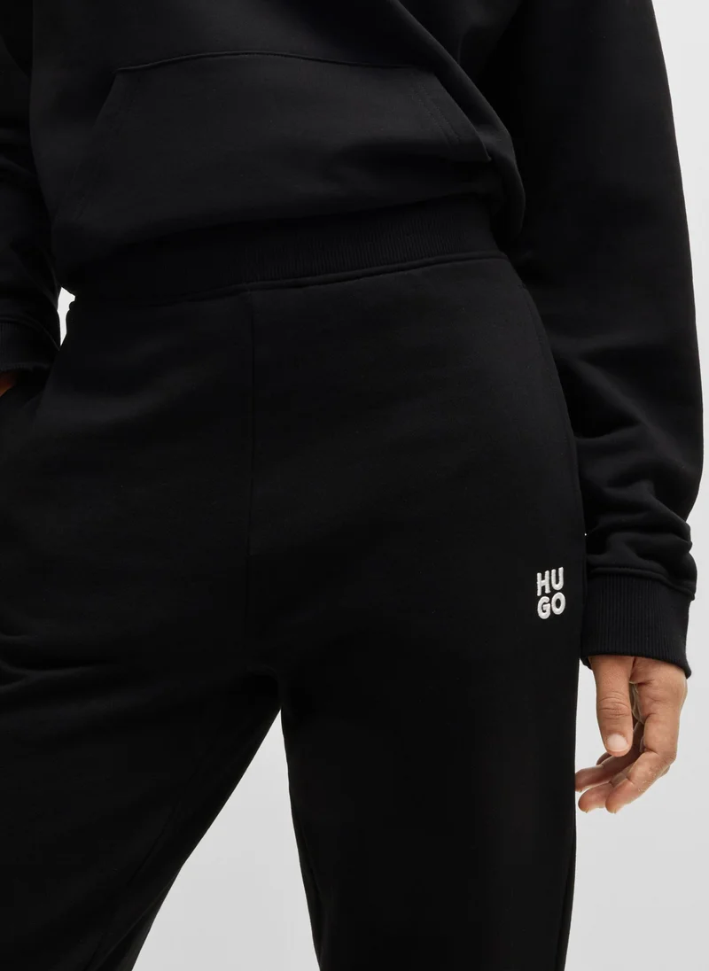 HUGO Cotton-terry tracksuit bottoms with stacked logo