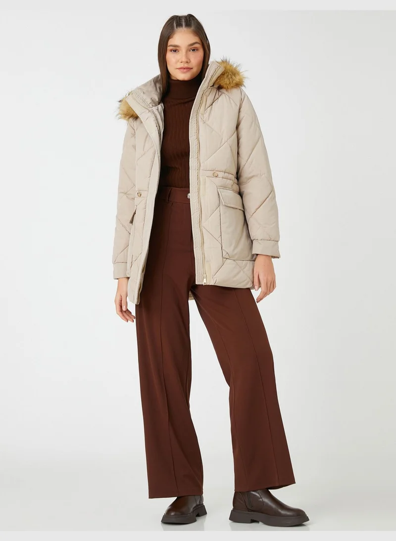 كوتون معطف مبطن بفرو صناعي مزين بجيوب وحزام خصر