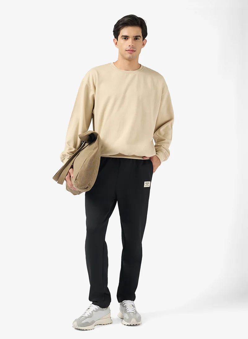 سفنتي فايف بيسيكس Relaxed Fit Emblem Joggers