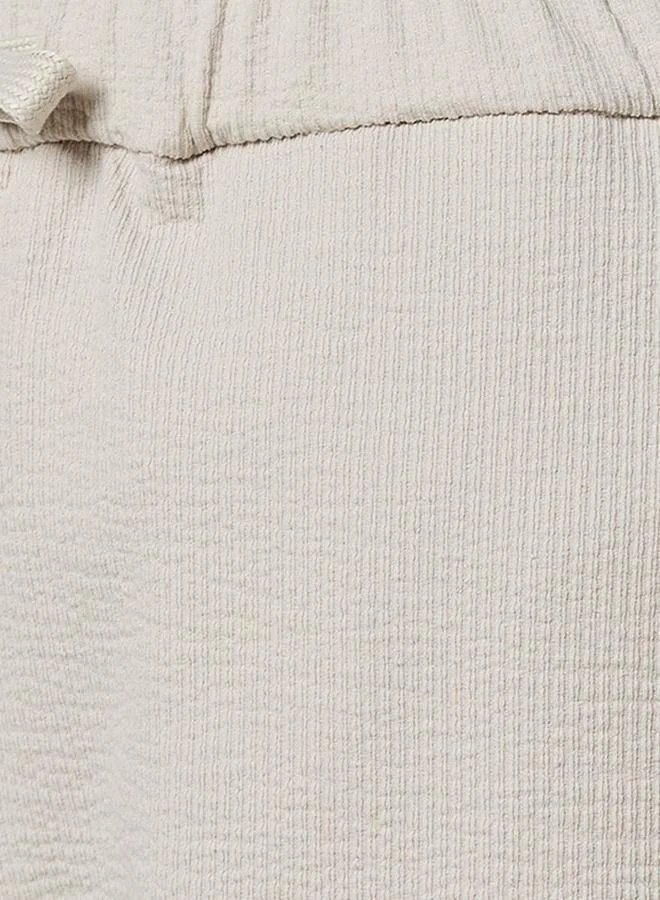 Iconic BEIGE Iconic Regular Fit Shorts for Men | Best Price UAE