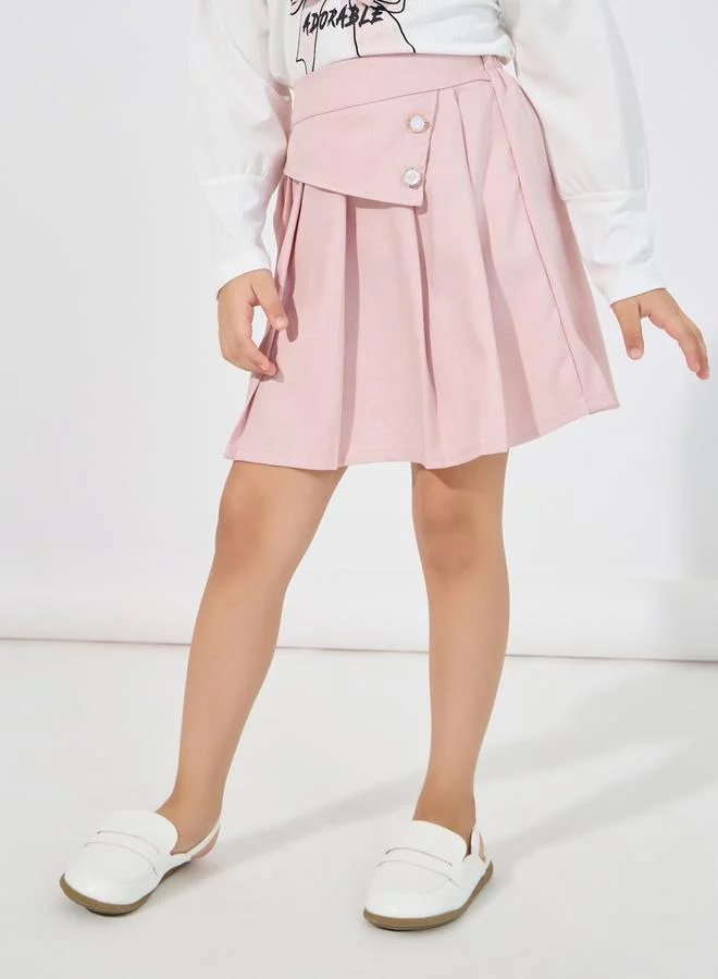 Styli Bow Applique Top & Asymmetric Waist Pleated Skirt Set