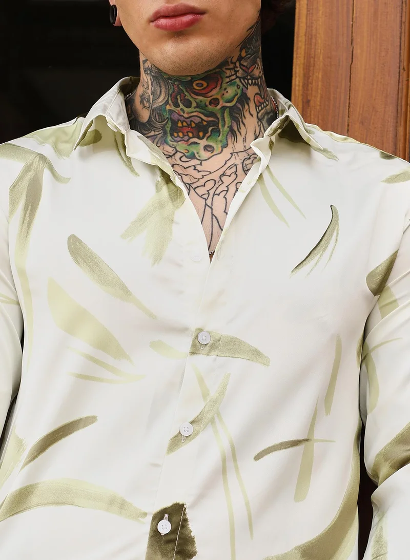 Campus Sutra Campus Sutra Men's Olive Green Contrast-Strokes Imprint Shirt | Spread Collar , Long Cuffed Sleeves , Button Closure , Curved Hem | Abstract Print Plain | Polyester Shirt For Casual Wear