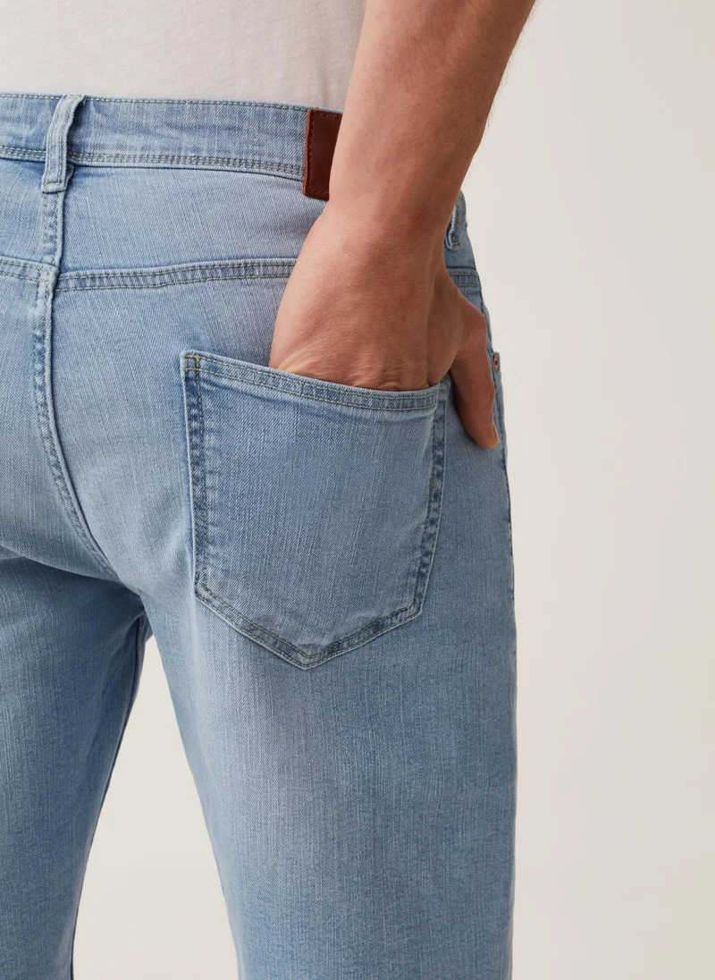 او في اس Regular-fit stretch denim Bermuda shorts