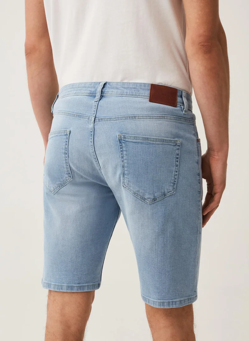 او في اس Regular-fit stretch denim Bermuda shorts