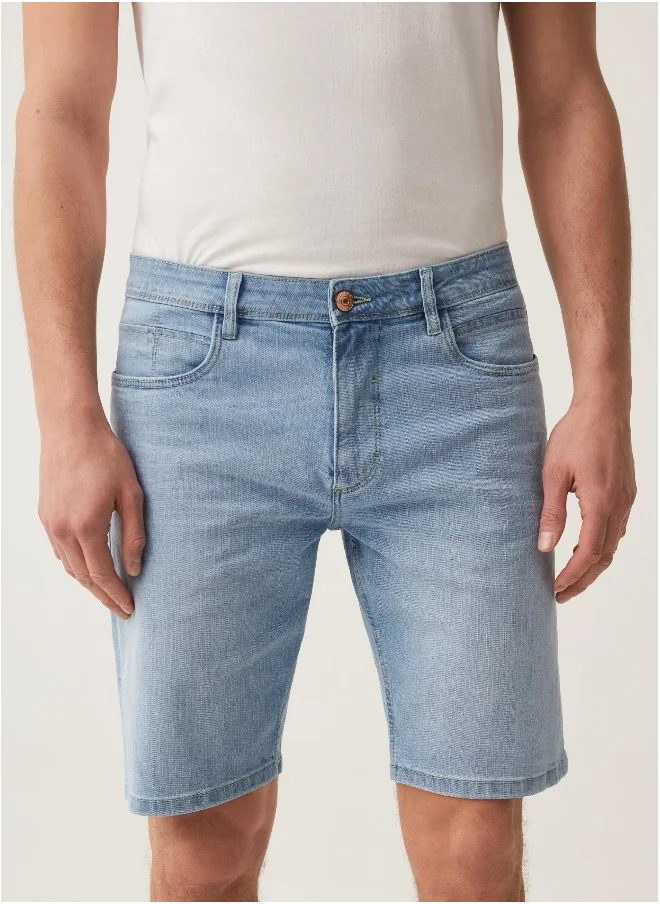 او في اس Regular-fit stretch denim Bermuda shorts