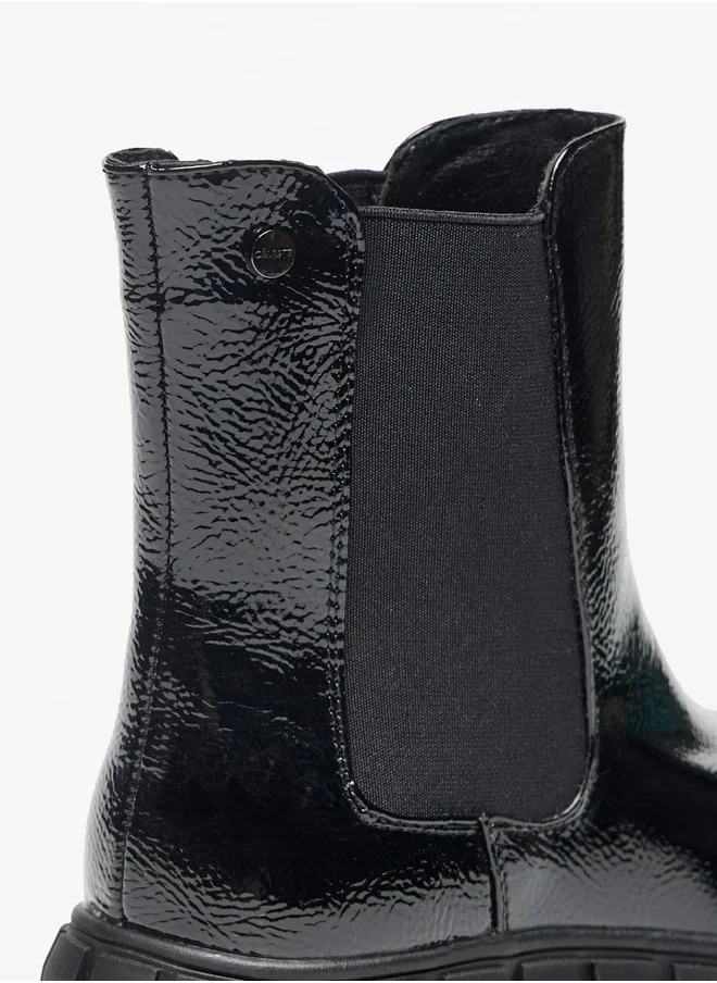 سيليست Women's Solid Slip-On Flatform Boots