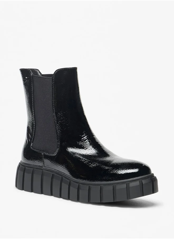 سيليست Women's Solid Slip-On Flatform Boots