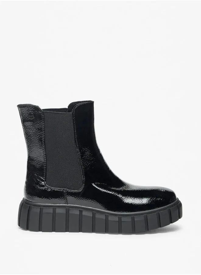 سيليست Women's Solid Slip-On Flatform Boots