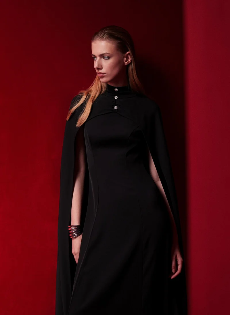 Fitted maxi dress with floor-length cape