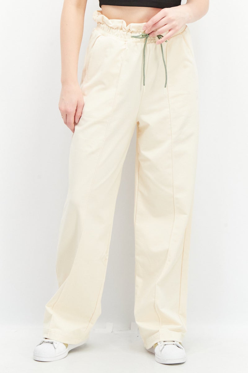 PUMA Women Sportswear Fit Embroidered Infuse Paperbag Outdoor Pants, Beige - Image 1