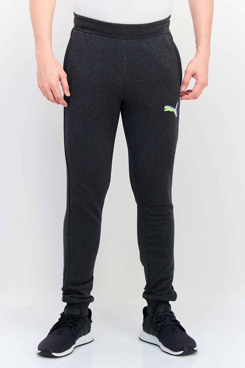PUMA Men Sportswear Fit Outdoor Sweatpants, Dark Grey - Image 1